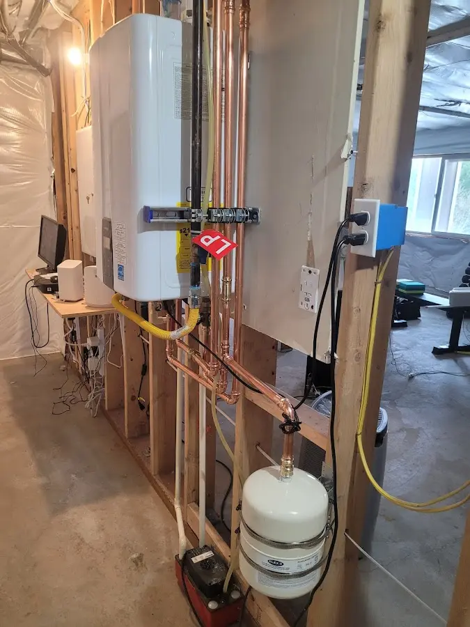 Licensed plumber repairing a kitchen sink in Deerfield