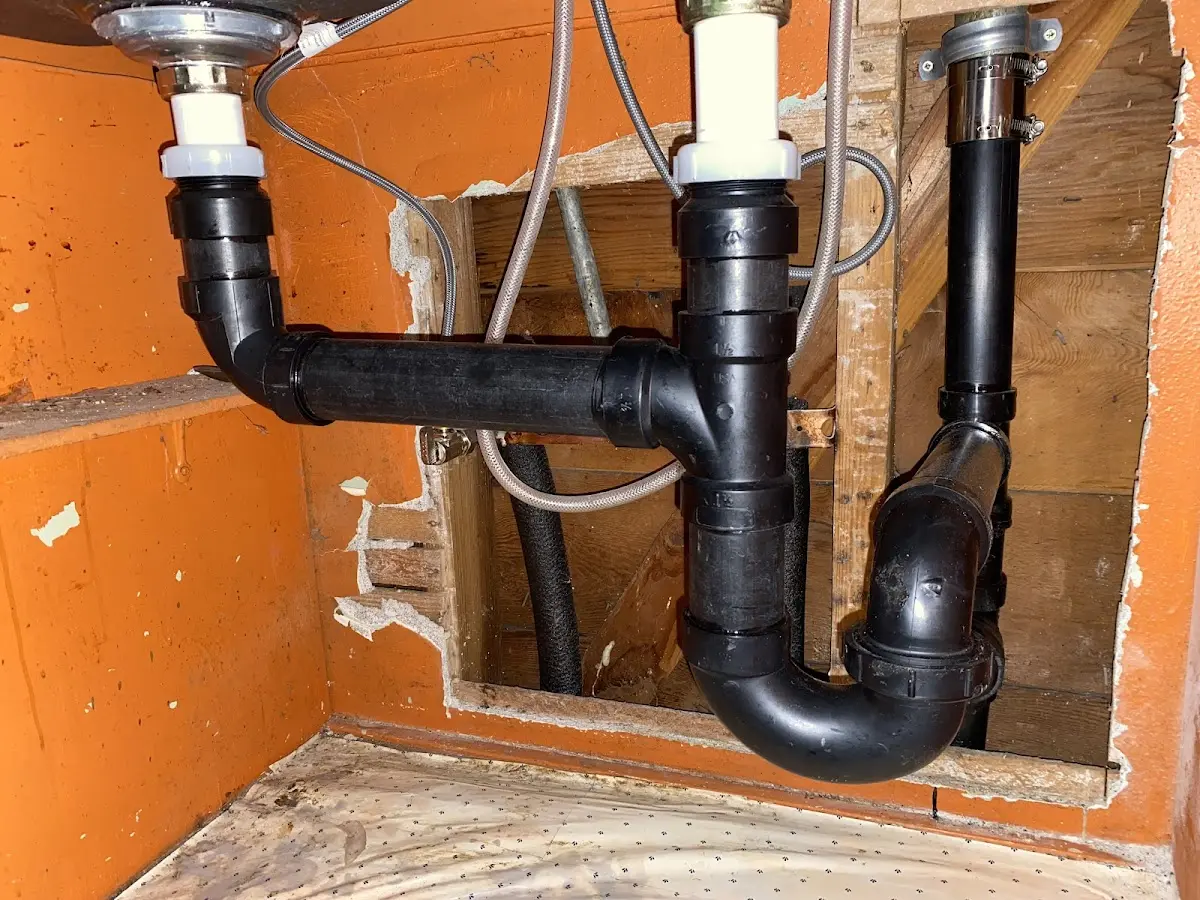 Professional Garbage Disposal Repair equipment and tools on the job in Deerfield